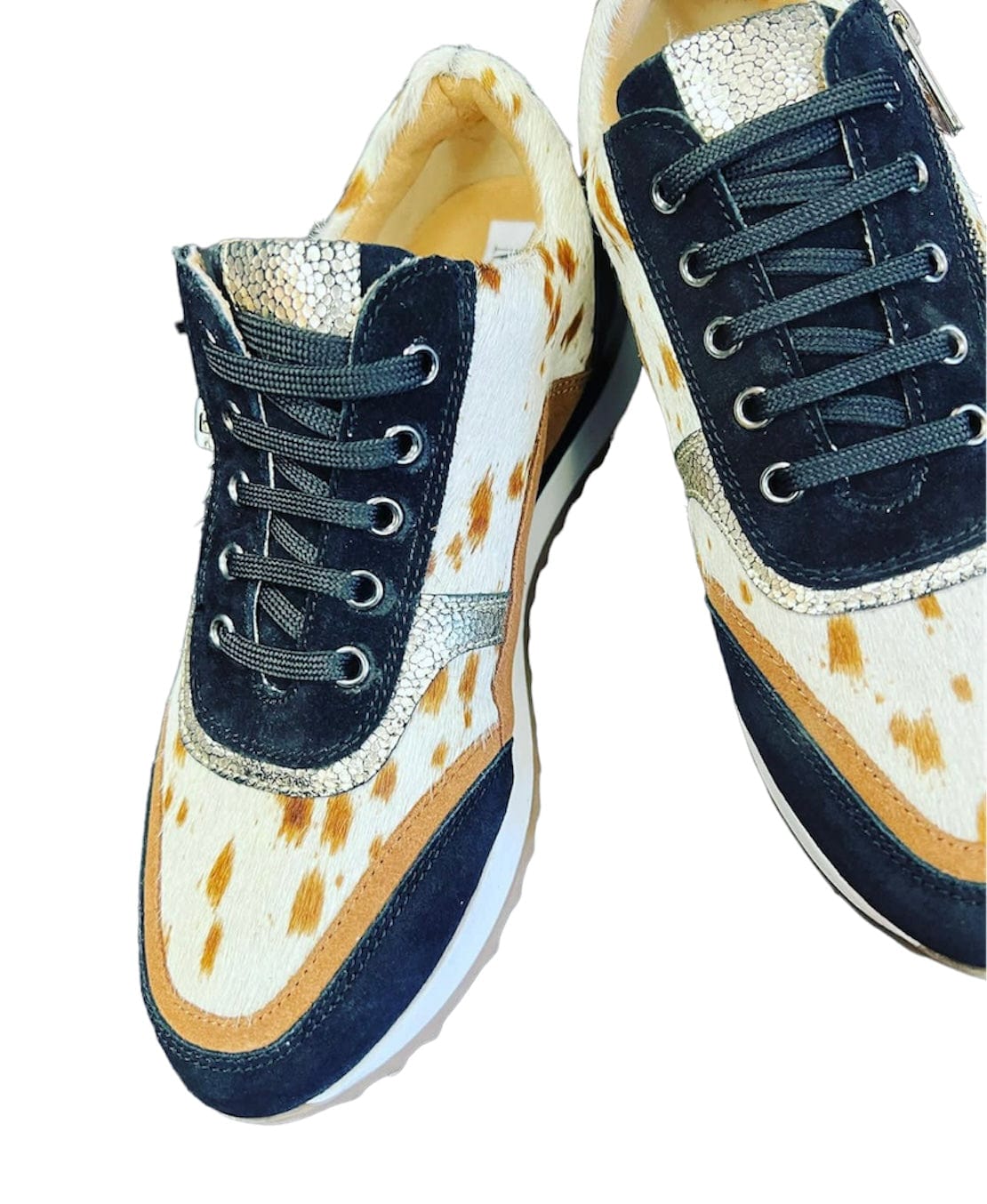 Brand of Bliss Hair on Hide Tennis Shoes